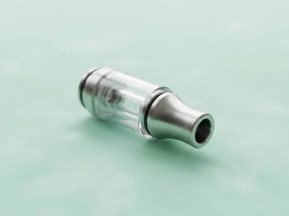 A vape mouthpiece and drip tip detached from a pod device